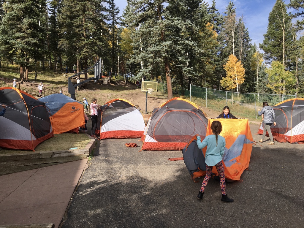 Students setting up their tents
